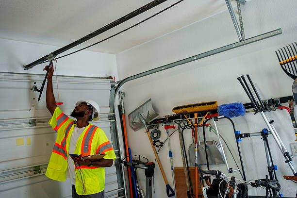 Professional Garage Door Panel Replacement technician working in Pleasant Hill, OH